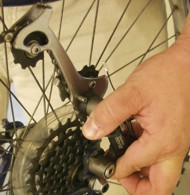 Pulling back rear derailleur