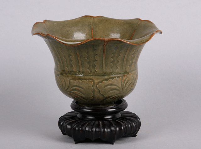 Celadon bowl on wood stand