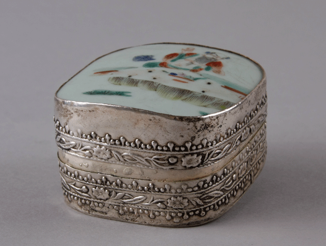 Metal box with porcelain shard lid