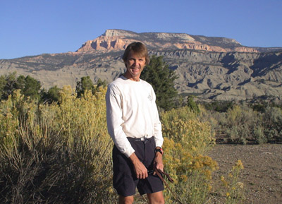 Jeff stopping for a view of 10,00 foot high Powell Point