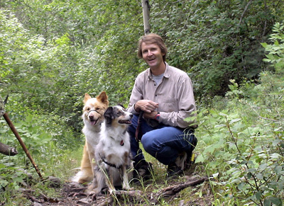 Jeff and dogs Freckles and Zosia hiking in northern NM