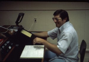 Al Marchiondo in 1975, sitting at an electron microscope