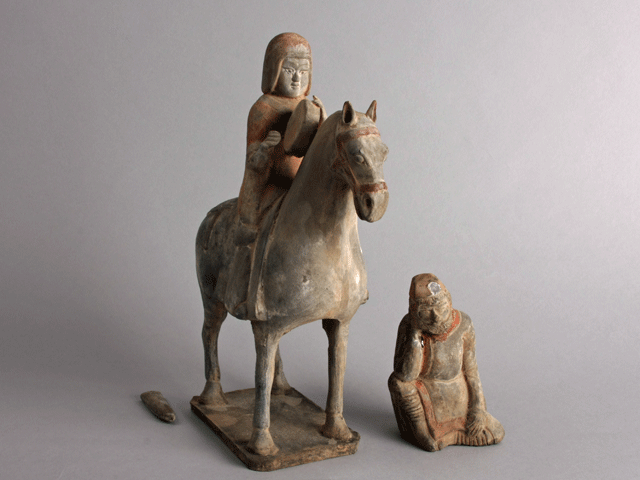 Horseback musician and attendant