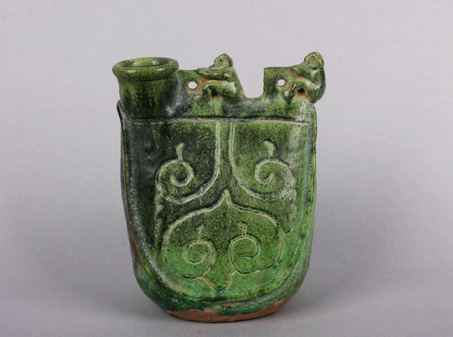 Green glaze saddle flask Green glaze saddle flask