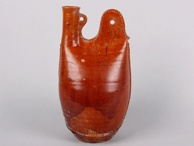 Brown glaze saddle flask