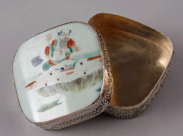 Metal box with porcelain shard lid